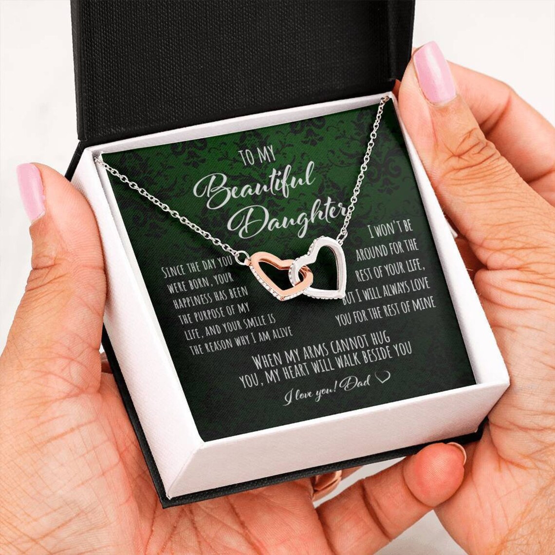 Interlocking hearts necklace in a gift box for daughter.