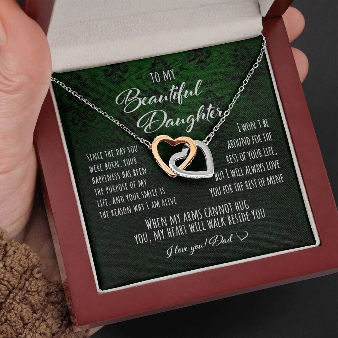 Interlocking hearts necklace luxury box in hand